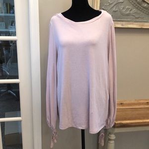 Boutique top, dusty rose color, tie sleeves, size small but runs big.